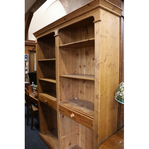 757 - Pine open-fronted bookcase, with two drawers, reeded panel front.