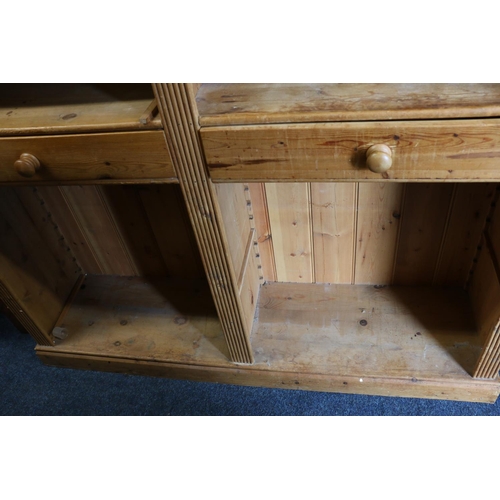 757 - Pine open-fronted bookcase, with two drawers, reeded panel front.