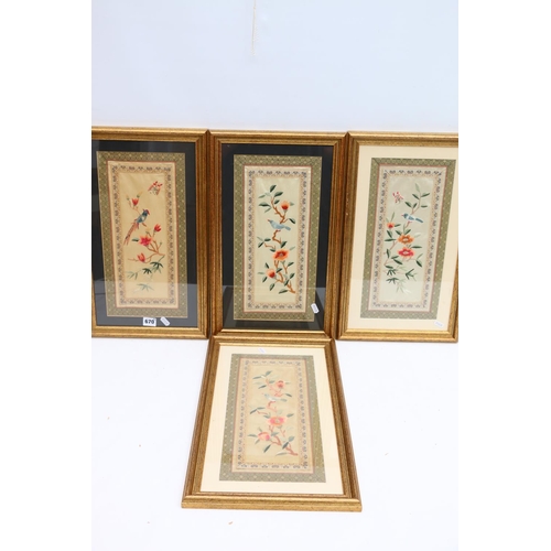 670 - CHINESE SCHOOL, set of four sewnwork silk panels depicting birds on flowering branches, frame size 5... 