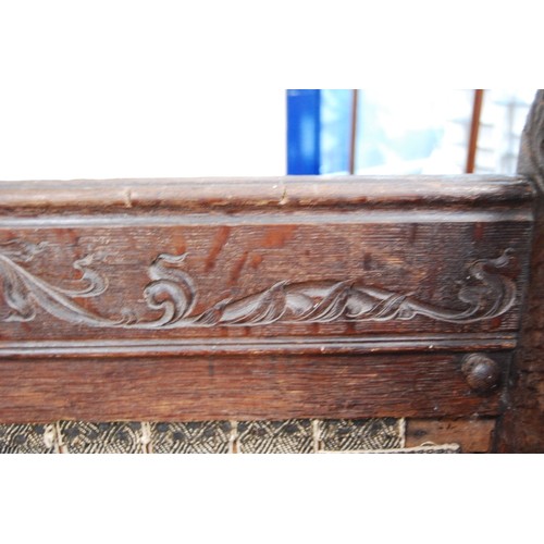 359 - 19th century continental carved oak hall bench decorated with carved floral, fruit, vine and acanthu... 