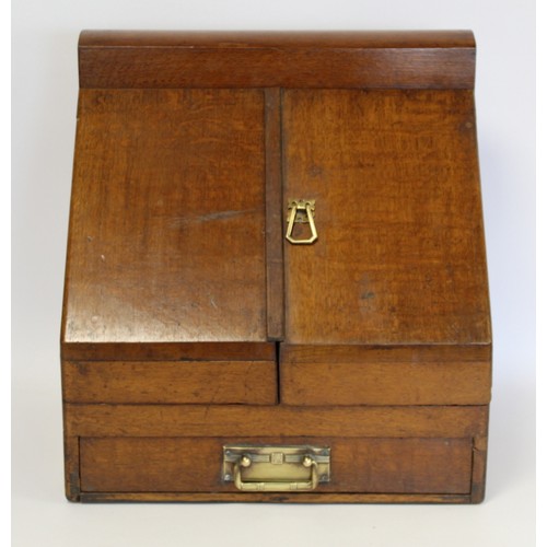 247 - Late 19th/early 20th century oak stationery/writing box of rectangular form, the sloping front with ... 