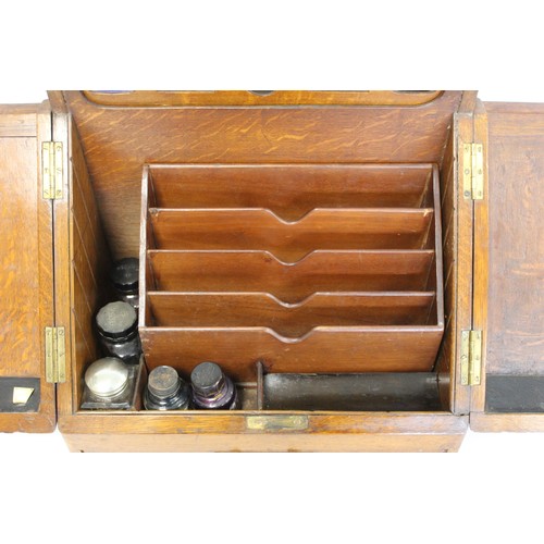 247 - Late 19th/early 20th century oak stationery/writing box of rectangular form, the sloping front with ... 