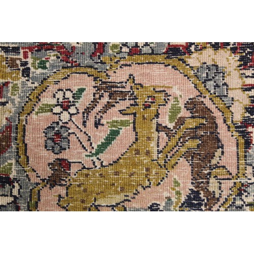 190 - Persian Qum (Qom) rug, the cream field with central flowerhead lozenge, floral sprays and border wit... 