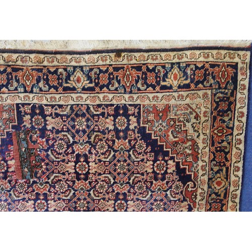 192 - Persian Bijar (Bidjar) rug with central lozenge on blue field with stylised floral medallions, spand... 