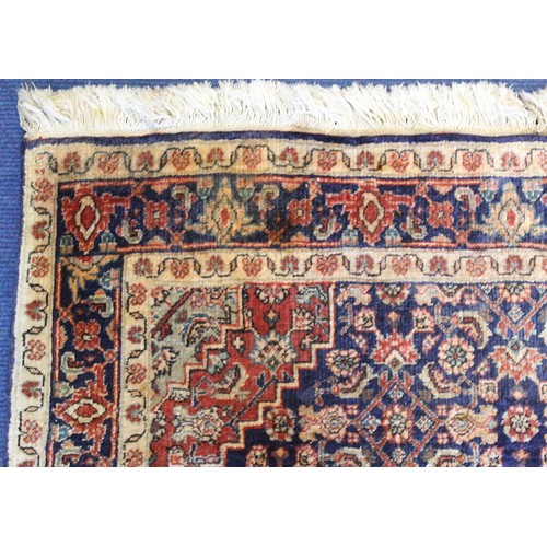 192 - Persian Bijar (Bidjar) rug with central lozenge on blue field with stylised floral medallions, spand... 