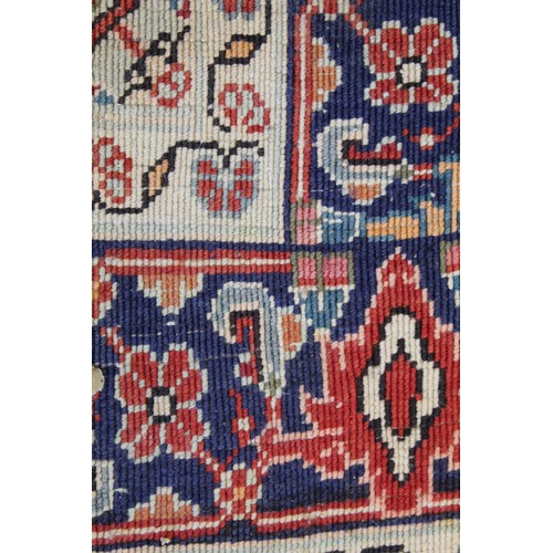 192 - Persian Bijar (Bidjar) rug with central lozenge on blue field with stylised floral medallions, spand... 