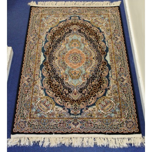 193 - Modern machine woven Kashan artificial silk rug with central floral lozenge, spandrels of vases of f... 