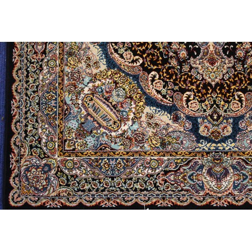 193 - Modern machine woven Kashan artificial silk rug with central floral lozenge, spandrels of vases of f... 