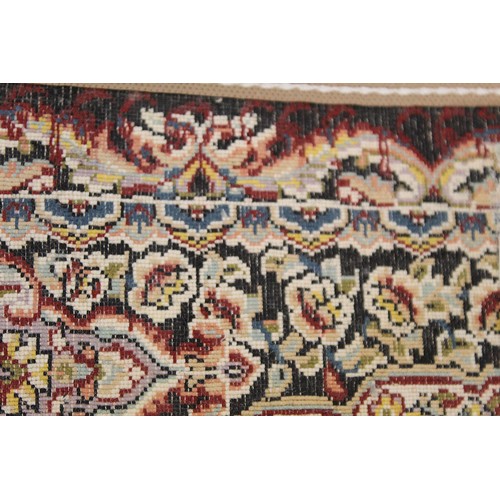 193 - Modern machine woven Kashan artificial silk rug with central floral lozenge, spandrels of vases of f... 