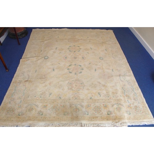 194 - Turkish Usak (Oushak) wool on cotton carpet, the cream ground with pale pastel floral and scroll dec... 