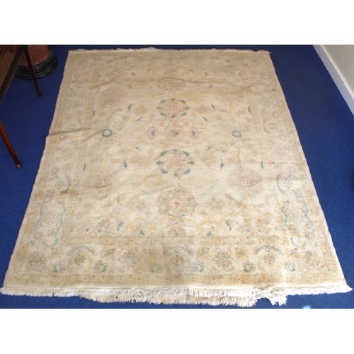 194 - Turkish Usak (Oushak) wool on cotton carpet, the cream ground with pale pastel floral and scroll dec... 