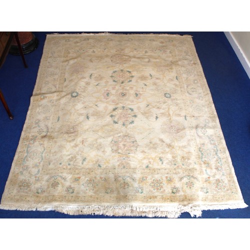 194 - Turkish Usak (Oushak) wool on cotton carpet, the cream ground with pale pastel floral and scroll dec... 