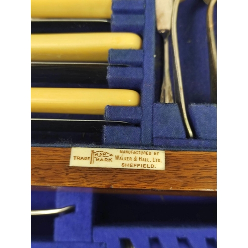 1 - Walker & Hall e.p. canteen of 'Old English' pattern cutlery in oak cabinet, 42cm.