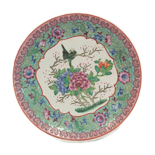 Chinese Republic porcelain famille rose plate decorated with birds amongst foliage.