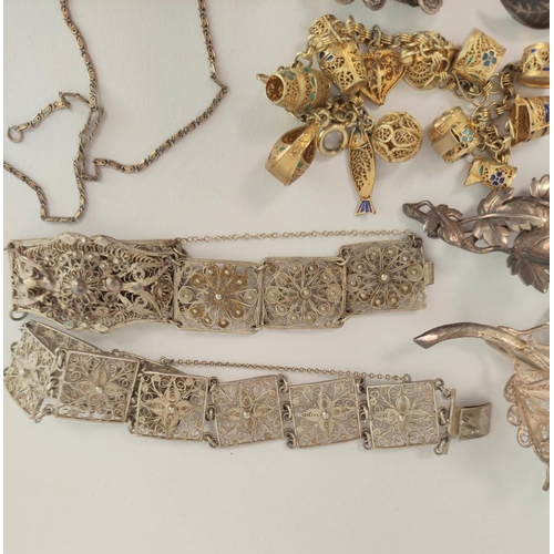 46 - Silver and carnelain bracelet, a silver gilt filigree bracelet and various similar items.