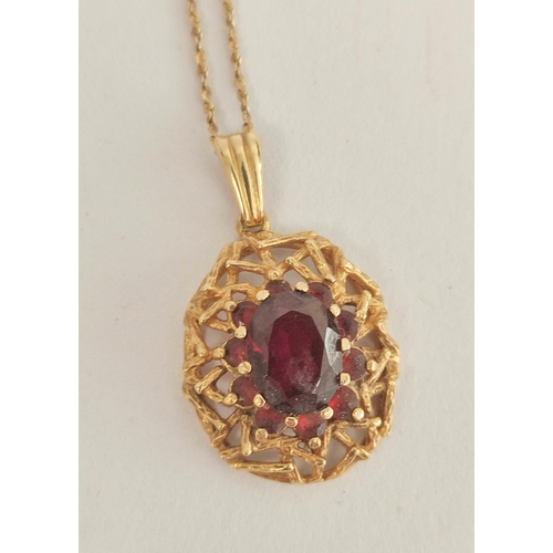 92 - Coral cameo pendant in gold '14k', a garnet pendant with necklets and another, 12g gross.