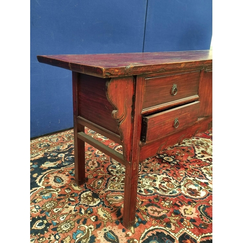 475 - Chinese lacquered pine low cupboard, of sleigh form with two pairs of drawers above a shaped apron, ... 