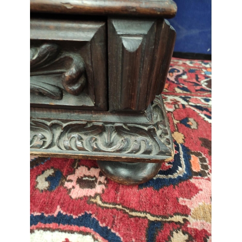 478 - Continental carved coffer, the hinged rectangular top with metal lock and escutcheon, carved profuse... 