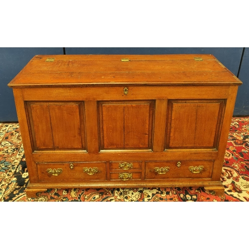 481 - George III oak dower chest, with a hinged top above a panelled frieze and two small drawers, flanked... 