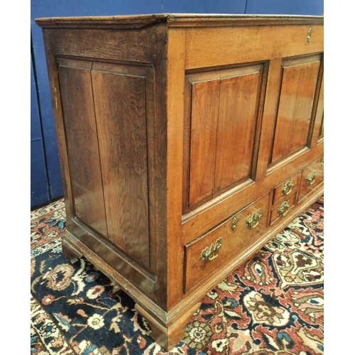 481 - George III oak dower chest, with a hinged top above a panelled frieze and two small drawers, flanked... 