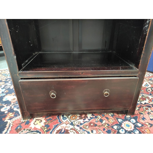 484 - Chinese lacquer display stand, with open section above shelving and a long drawer, carved panels to ... 