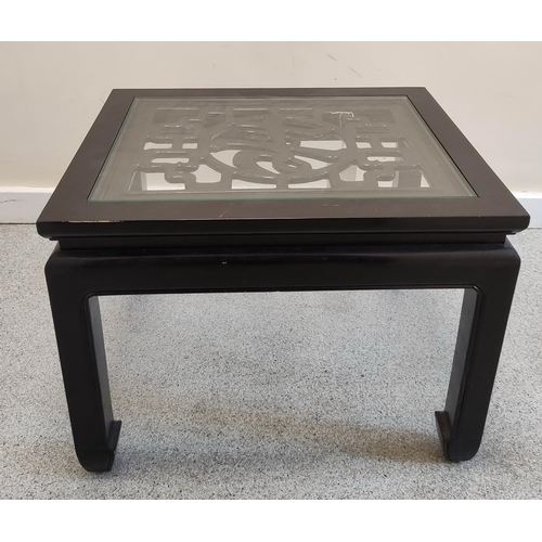 492 - Chinese ebonised longevity coffee table, with a pierced top on shaped supports. 46cm high, 62.5cm wi... 