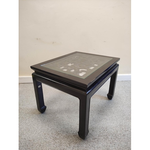 492 - Chinese ebonised longevity coffee table, with a pierced top on shaped supports. 46cm high, 62.5cm wi... 