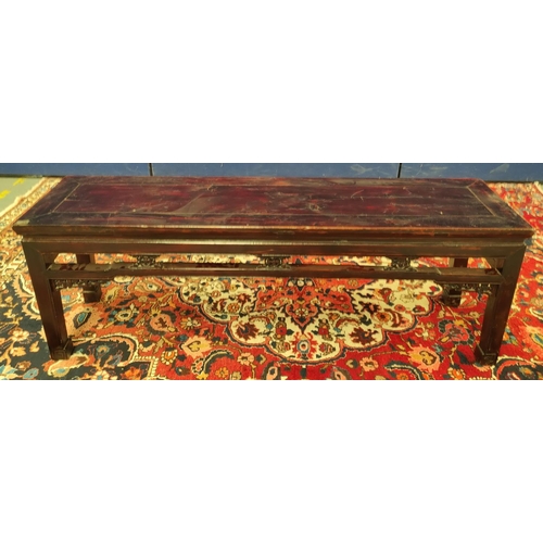 495 - Antique Chinese lacquer bench, the rectangular top with pierced frieze sides and fret scrolls above ... 