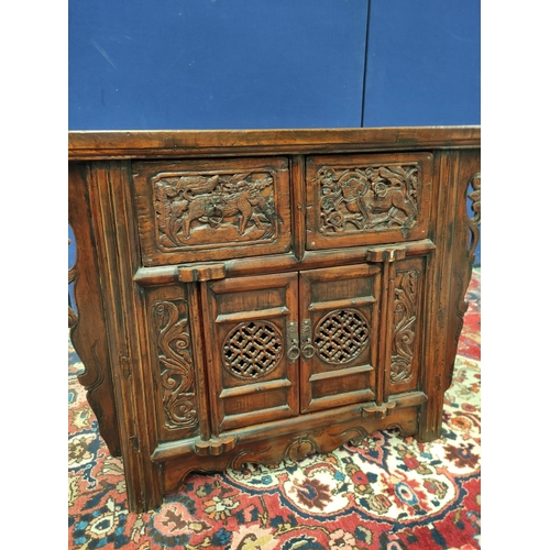 497 - Antique Chinese Shanxi carved elm cabinet, With two deep drawers above two cupboard doors decorated ... 