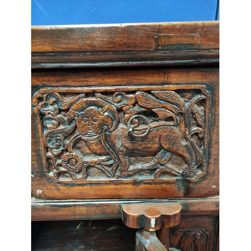 497 - Antique Chinese Shanxi carved elm cabinet, With two deep drawers above two cupboard doors decorated ... 