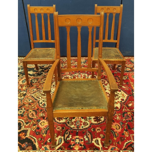 505 - Seven matching Arts & Crafts oak dining chairs, circa 1920s/1930s, with three plain circular rou... 