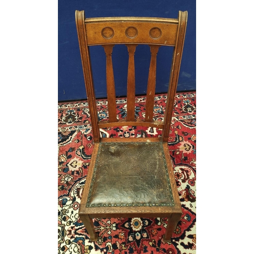 505 - Seven matching Arts & Crafts oak dining chairs, circa 1920s/1930s, with three plain circular rou... 