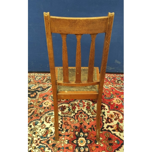 505 - Seven matching Arts & Crafts oak dining chairs, circa 1920s/1930s, with three plain circular rou... 