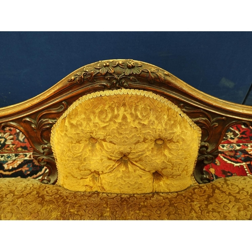 509 - Victorian mahogany scroll end settee upholstered in later gold coloured button back dralon, decorate... 