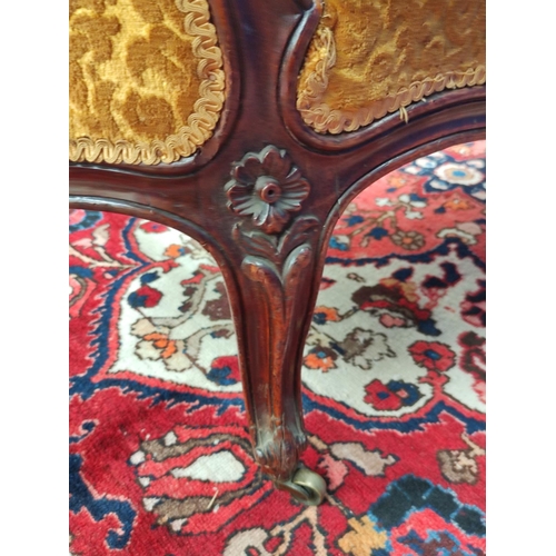 509 - Victorian mahogany scroll end settee upholstered in later gold coloured button back dralon, decorate... 