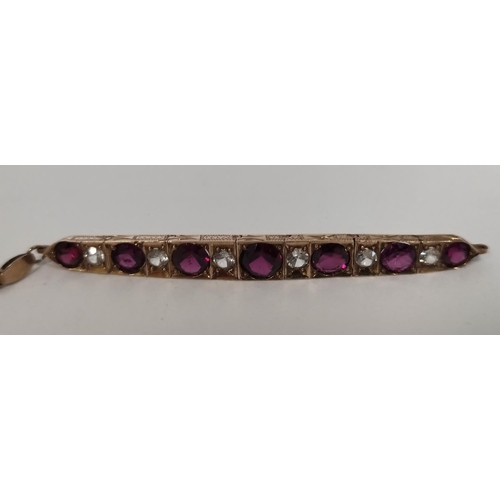 80 - Continental gold bracelet with garnets and white spinels, 8.7g gross.