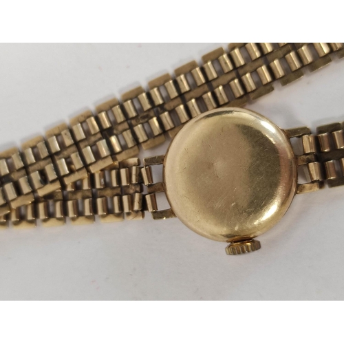 83 - Lady's 9ct gold bracelet watch, 19.5g gross.