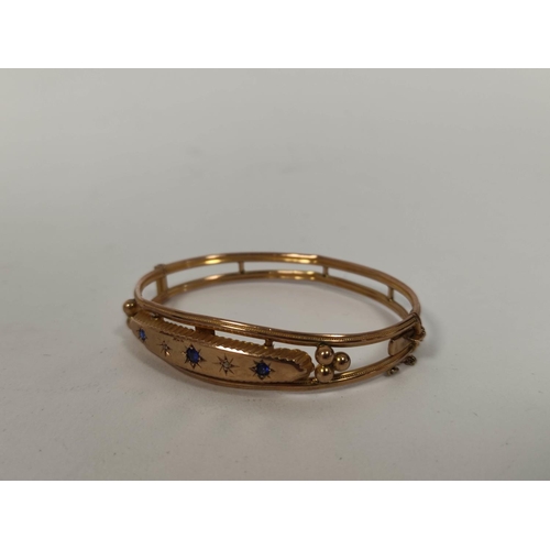 85 - 9ct gold bangle with tiny diamonds and sapphires, Chester 1908, 8.2g.