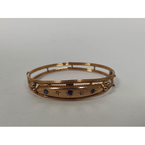 85 - 9ct gold bangle with tiny diamonds and sapphires, Chester 1908, 8.2g.