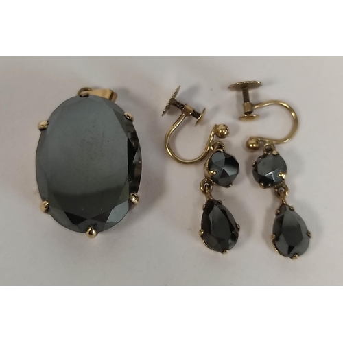 89 - Haematite pendant and a pair of matching earrings, 9ct gold.