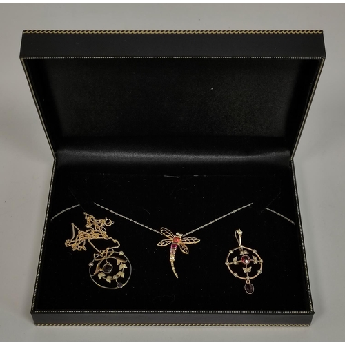 93 - Two gold circular pendants with garnets and pearls and another a garnet set dragon fly with two neck... 