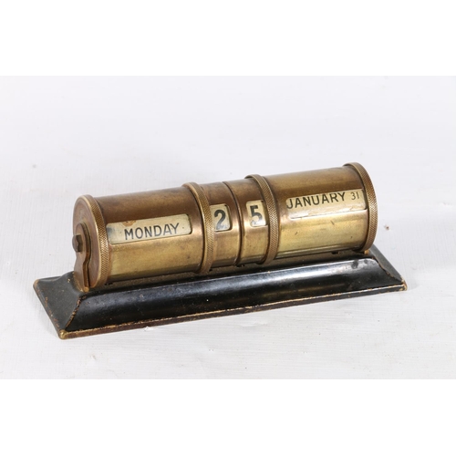 12 - Vintage brass cylindrical desk calendar, 14cm.