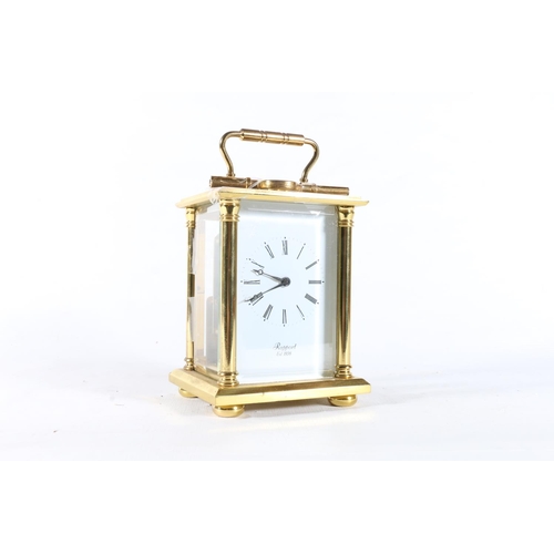 43 - Rapport brass and glass carriage clock.