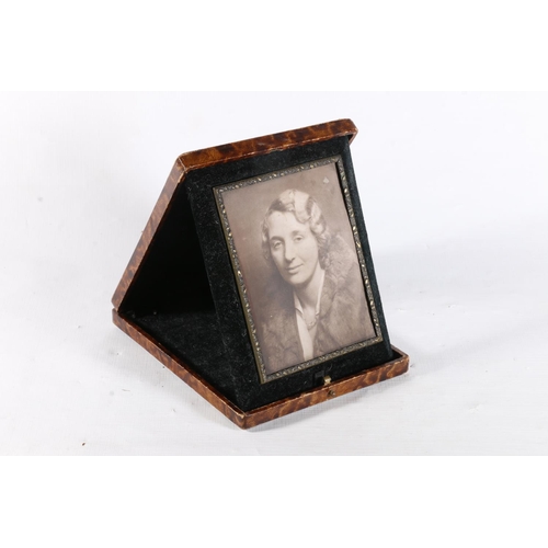 48 - Vintage leather covered folding photograph frame with portrait, 16cm.