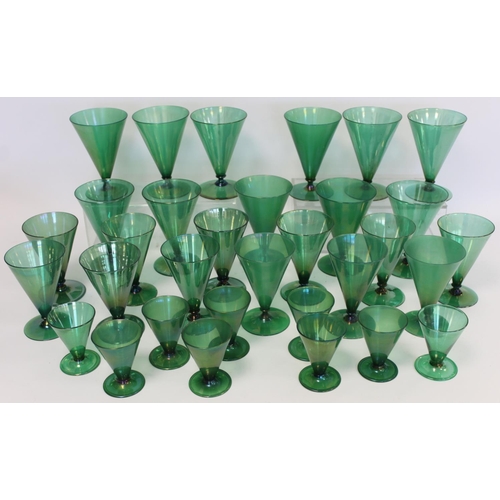 206 - Art Deco green lustre glass part suite of drinking glasses, all with conical bowls on short waisted ... 