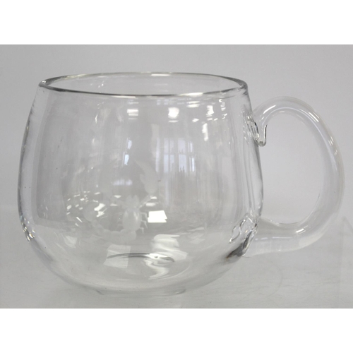 208 - Large glass mug or bowl of circular bulbous form with single scroll handle and etched scorpion motif... 