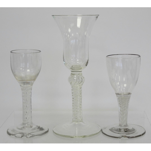 209 - Antique drinking glass, the bell shaped bowl on knopped air twist straight stem and domed circular f... 