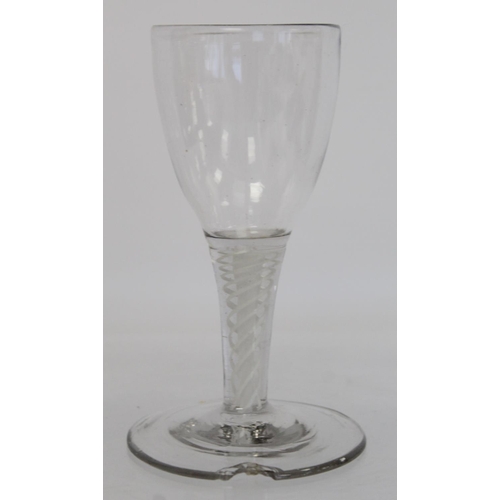 209 - Antique drinking glass, the bell shaped bowl on knopped air twist straight stem and domed circular f... 