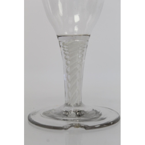 209 - Antique drinking glass, the bell shaped bowl on knopped air twist straight stem and domed circular f... 