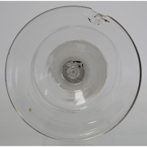 209 - Antique drinking glass, the bell shaped bowl on knopped air twist straight stem and domed circular f... 